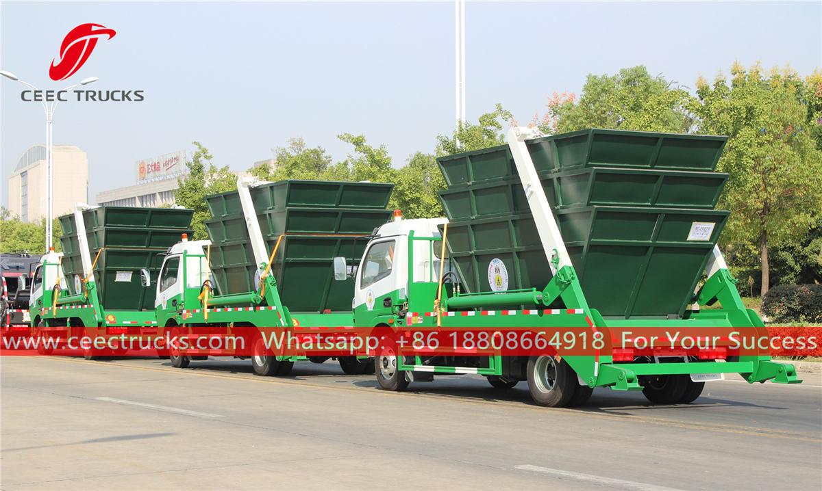 Swing arm garbage trucks with bins Swing arm garbage trucks with bins