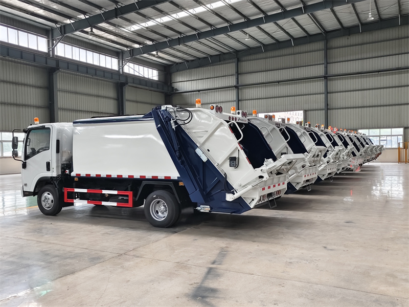 Isuzu NPR garbage compactor truck